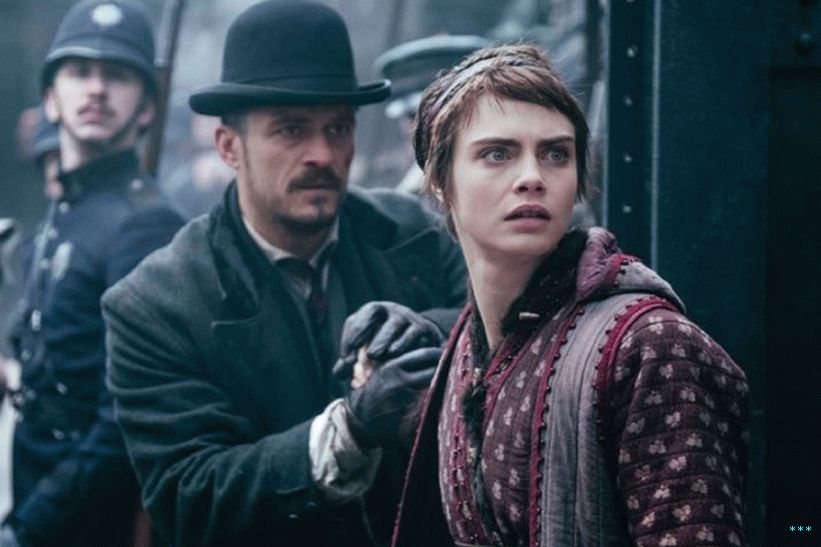 Orlando Bloom a Cara Delevingne hrají v karnevalové řadě jako lidský detektiv a uprchlíci.